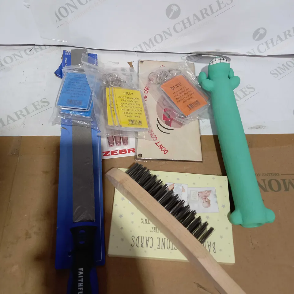 BOX OF ASSORTED HOUSEHOLD ITEMS TOO INCLUDE DOG TOYS AND TOOLS 