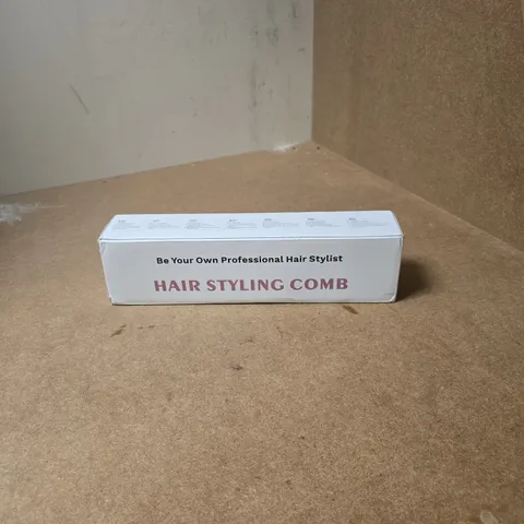 BOX OF APPROXIMATELY 15 ASSORTED ITEMS INCLUDING HAIR STYLING COMB , IMMERSION WATER HEATER AND MOTOROLA BACK UP LINE PHONE