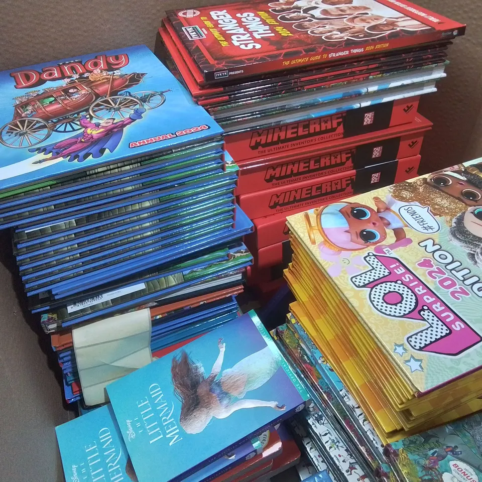 LARGE QUANTITY OF ASSORTED BOOKS AND 2024 ANNUALS TO INCLUDE GUINESS RECORDS 2024,  MINECRAFT, DANDY AND STRANGER THINGS