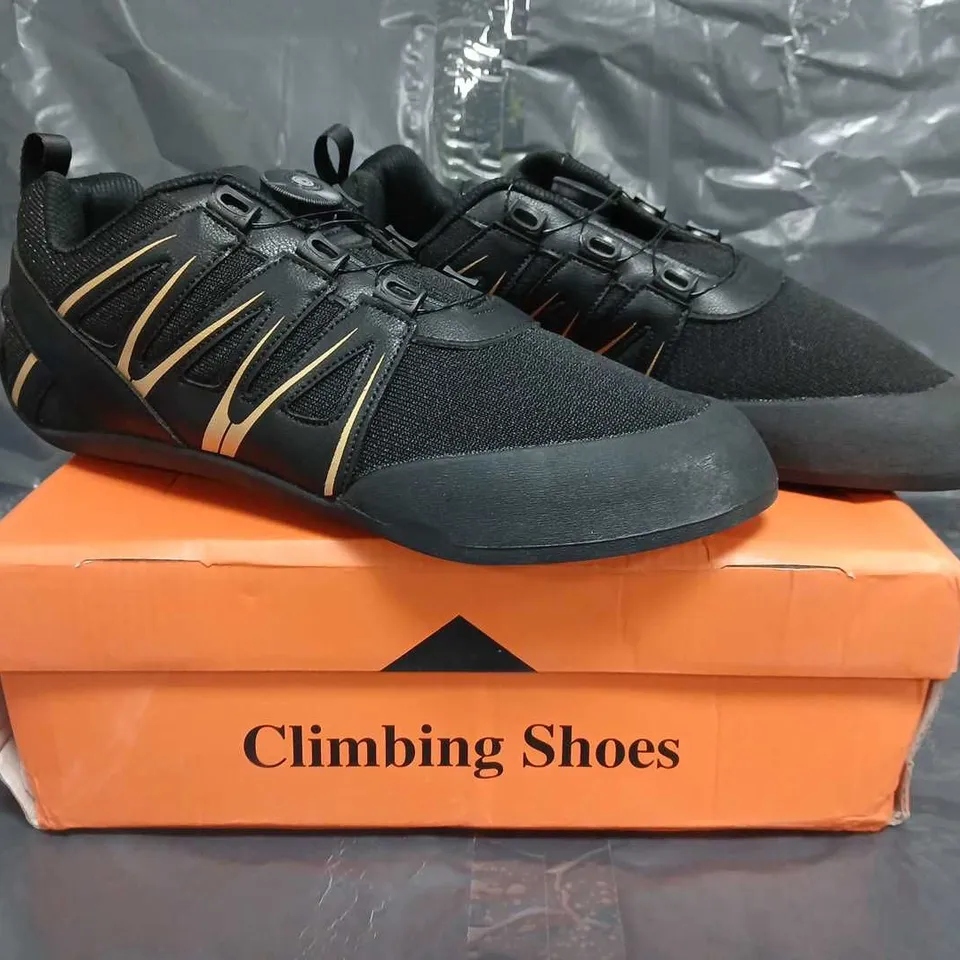 BOXED PAIR OF UNBRANDED CLIMBING SHOES IN BLACK/GOLD SIZE EU 45