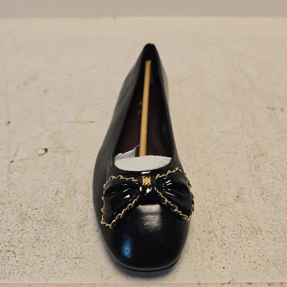 RIVER ISLAND BLACK PATENT BOW FLATS – UK4