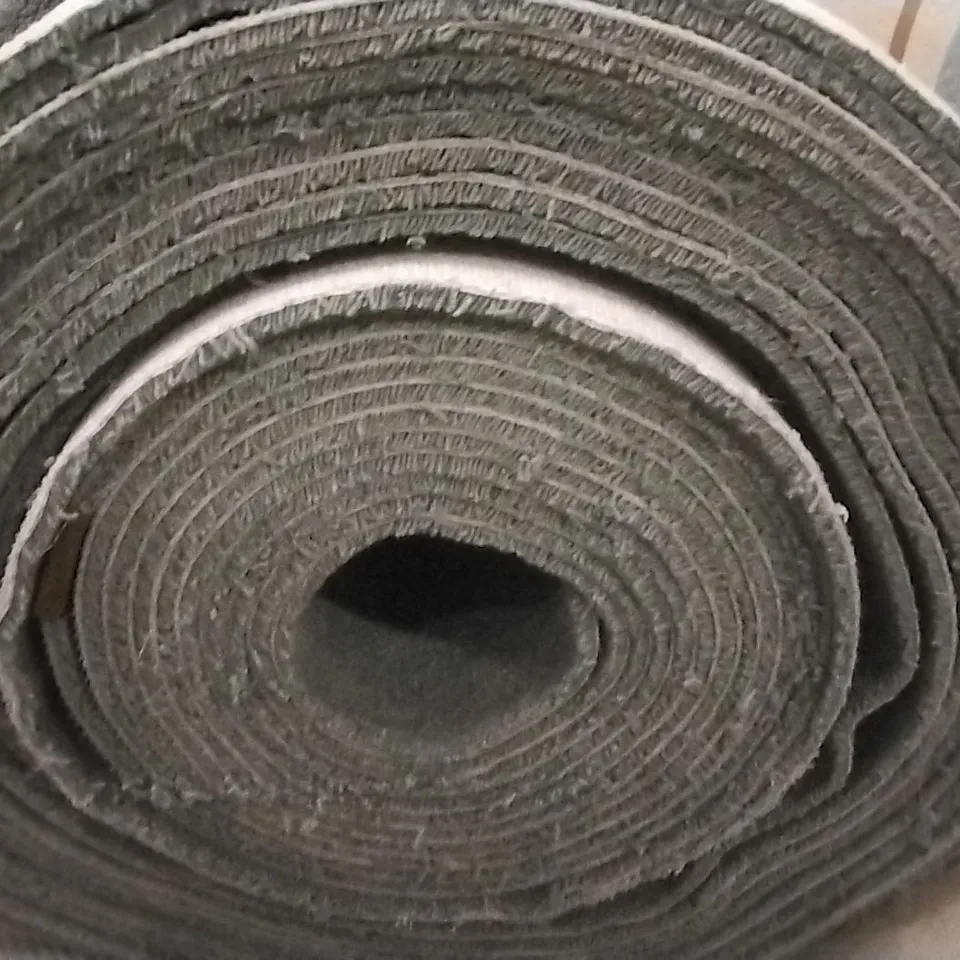 ROLL OF CRAFTSMAN SOLAR GREEN CARPET APPROXIMATELY 4M X 24.07M