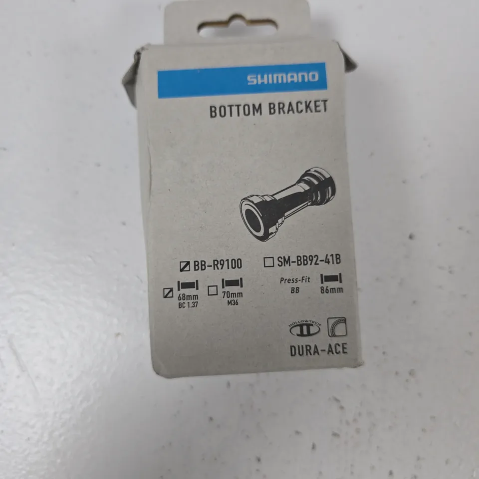 TOTE OF APPROXIMATELY 14 ASSORTED AUTO ITEMS TO INCLUDE: SHIMANO BOTTOM BRACKET