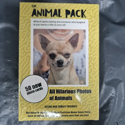 BOX OF APPROXIMATELY 12 SEALED ANIMAL PHOTO CARD PACKS FOR THE CHRISTIAN MEME GAME