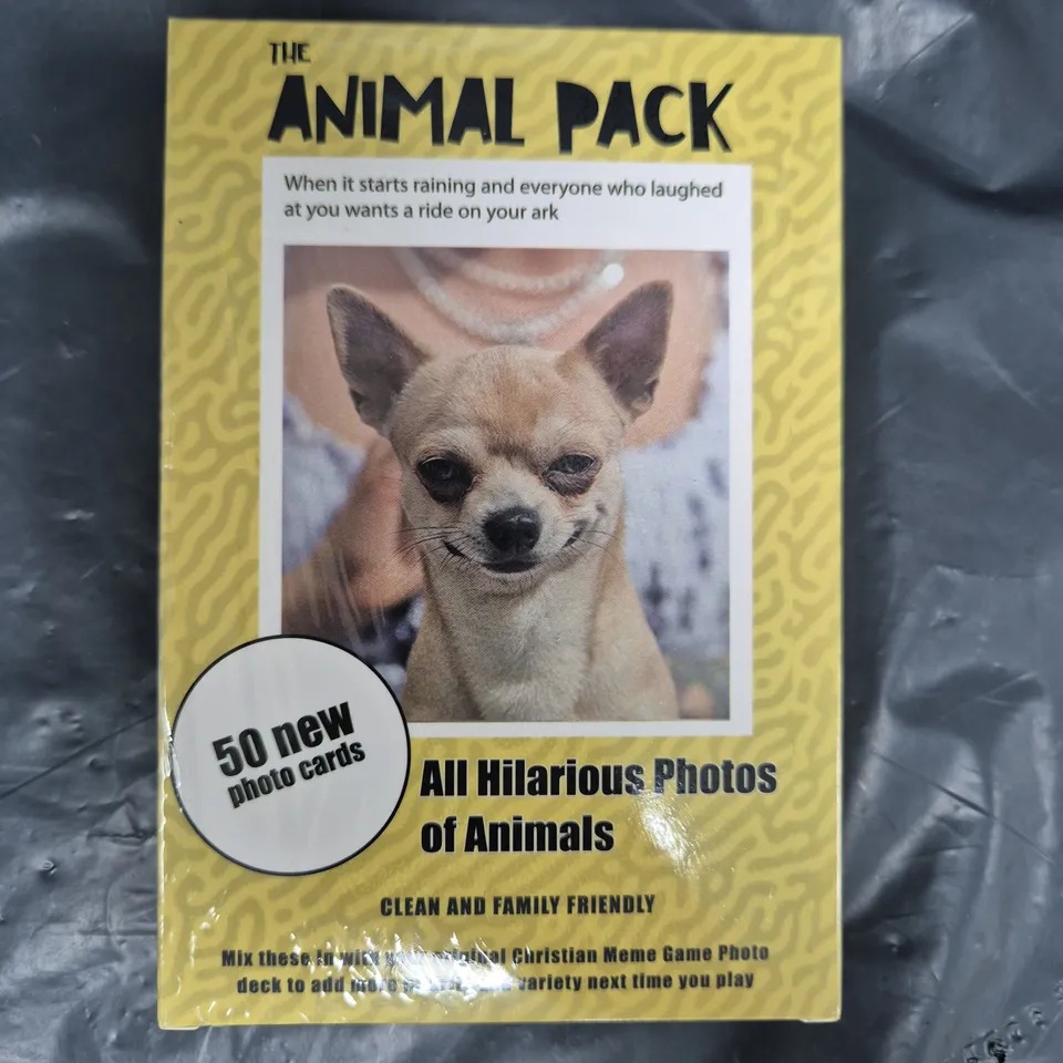 BOX OF APPROXIMATELY 12 SEALED ANIMAL PHOTO CARD PACKS FOR THE CHRISTIAN MEME GAME