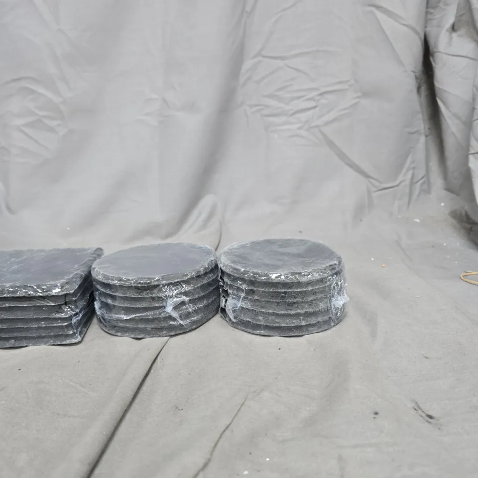 APPROXIMATELY 22 STONE COASTERS