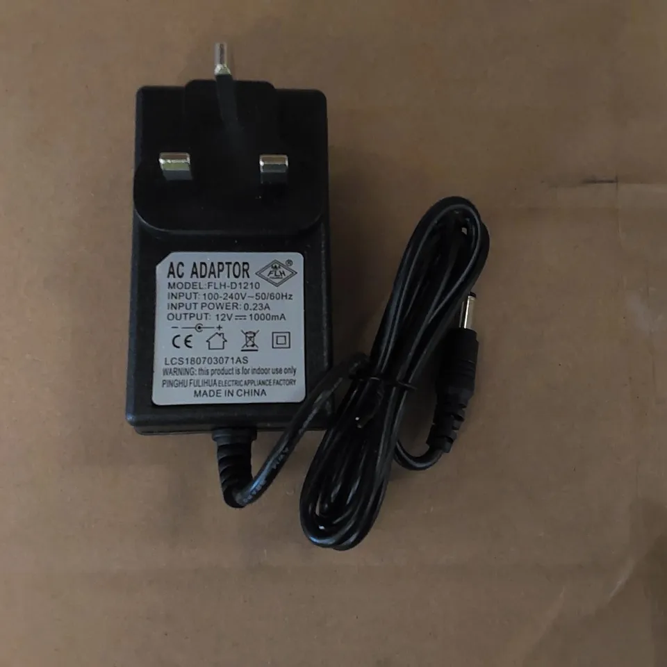 LOT OF APPROXIMATELY 50X BRAND NEW BOXED FLH-D1210 AC ADAPTERS (1 BOX)