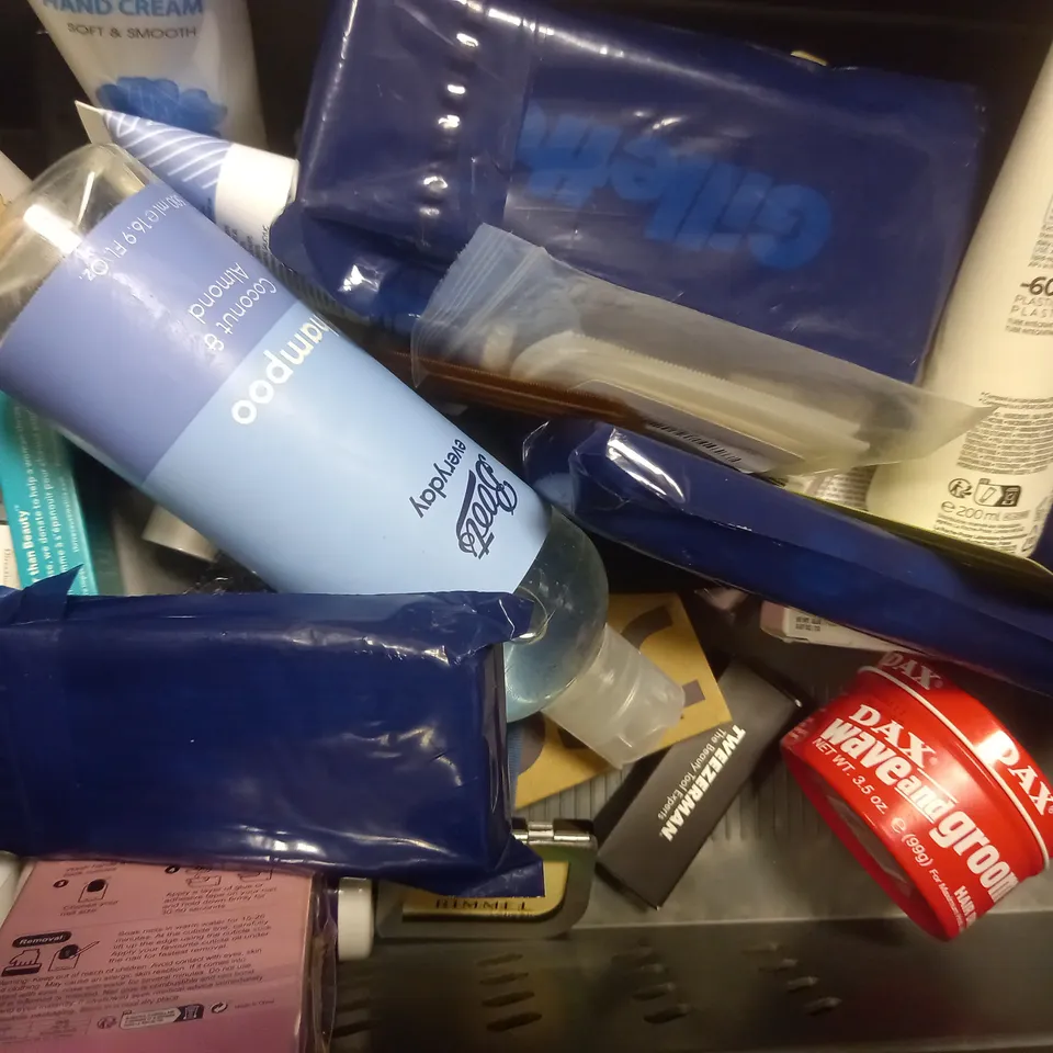 BOX OF ASSORTED COSMETIC ITEMS TOO INCLUDE WAX , SHAMPOO AND MAKEUP 