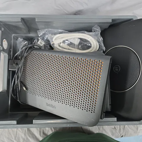 BOX OF ASSORTED CABLES AND MODEMS  