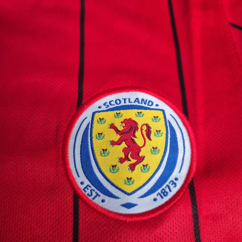 SCOTLAND NATIONAL TEAM FOOTBALL SHIRT – UMBRO, RED WITH BLACK PINSTRIPES, UK SIZE S