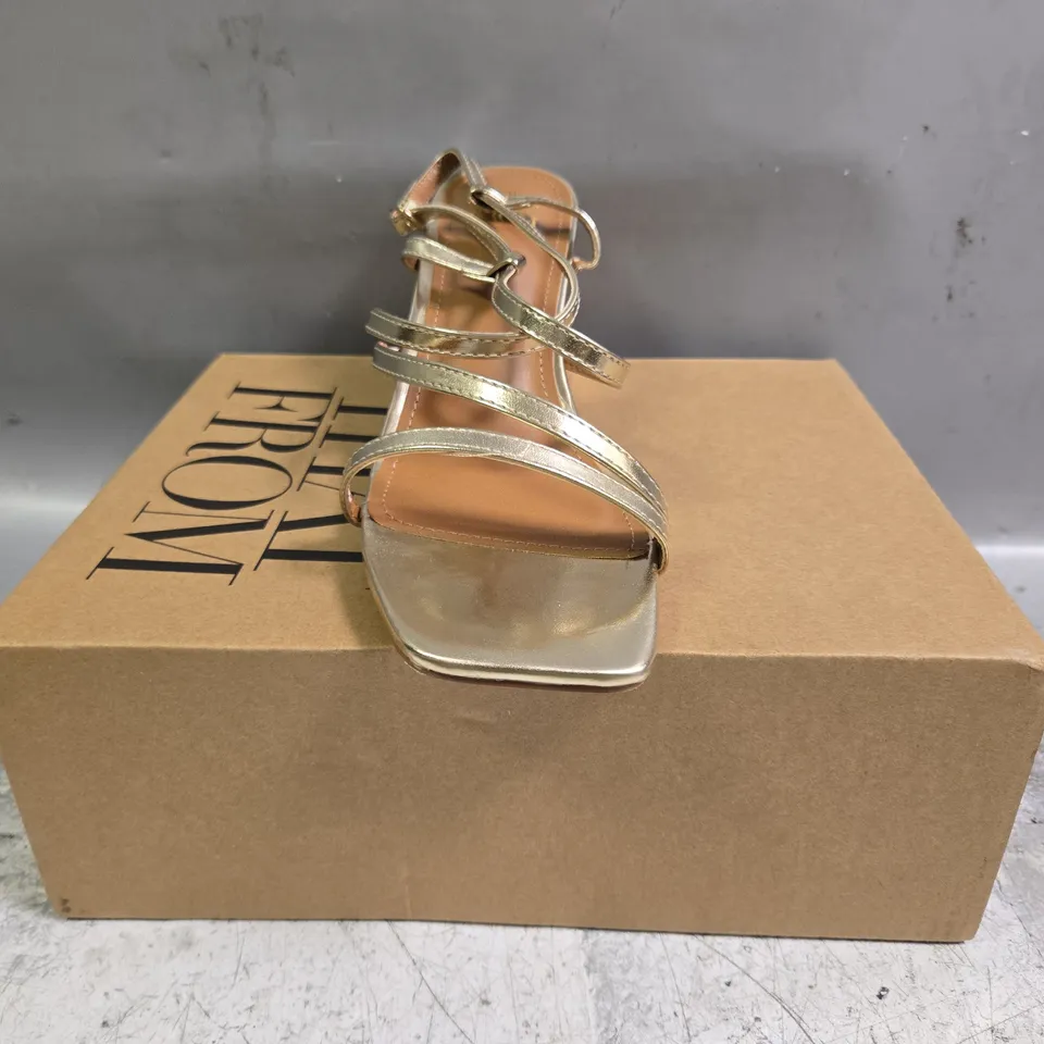 BOXED PAIR OF WHERE'S THAT FROM OPEN TOE BLOCK HEEL SANDALS IN METALLIC GOLD SIZE UK 7