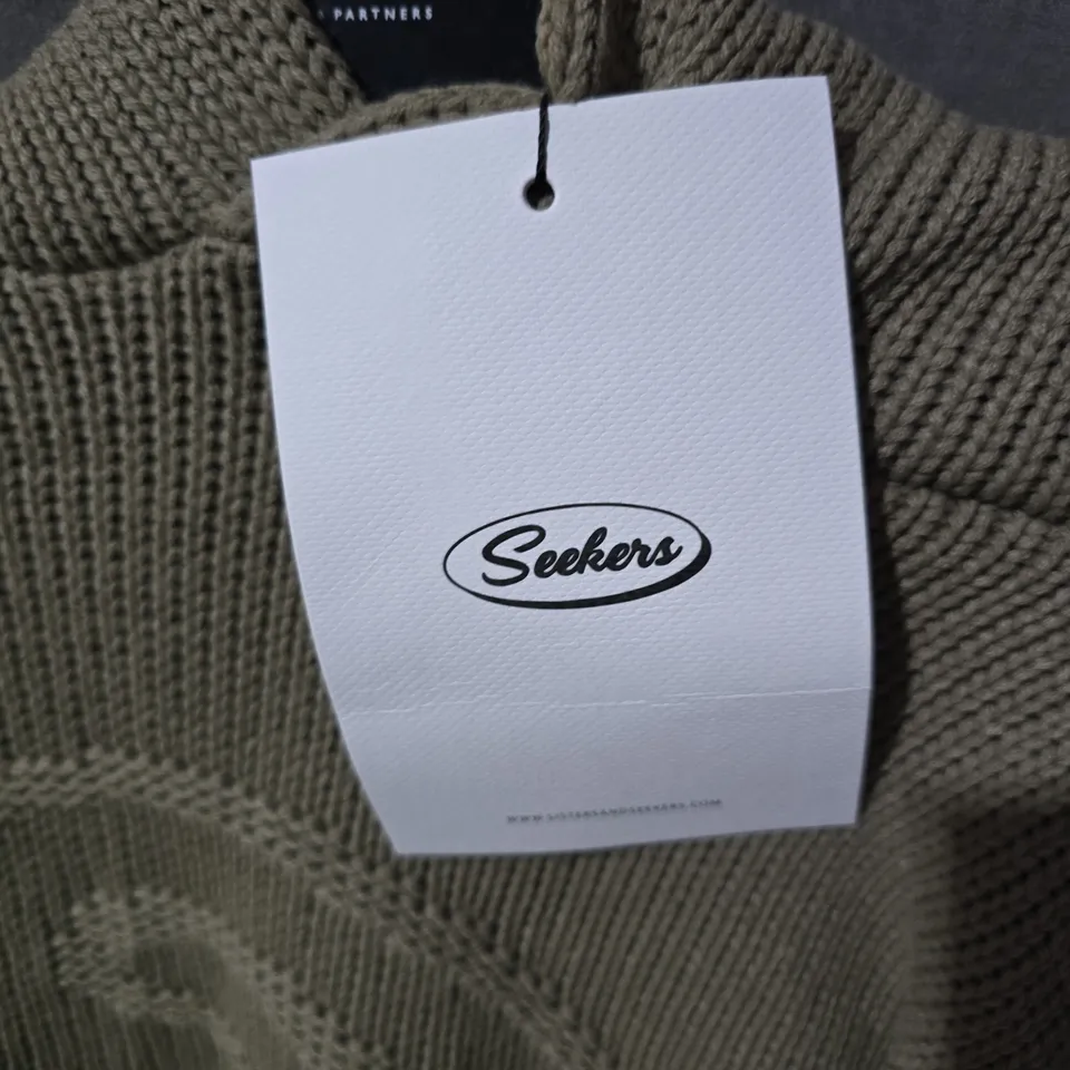 SEEKERS WOMEN’S OLIVE KNIT WOOL SWEATER – CHUNKY, HIGH-NECK (SISTERS & SEEKERS)