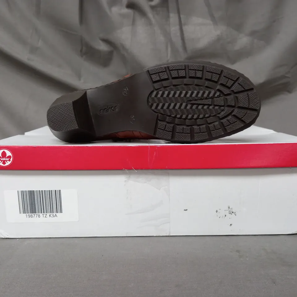BOXED PAIR OF RIEKER BOOTS IN TAN SIZE 3.5