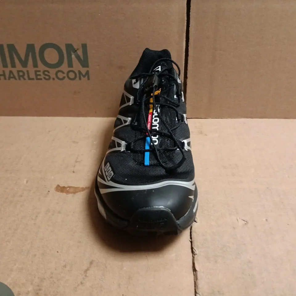 salomon trainers in black/sillver size uk 5