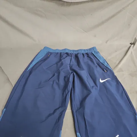 NIKE NAVY TRACK PANTS – XL 