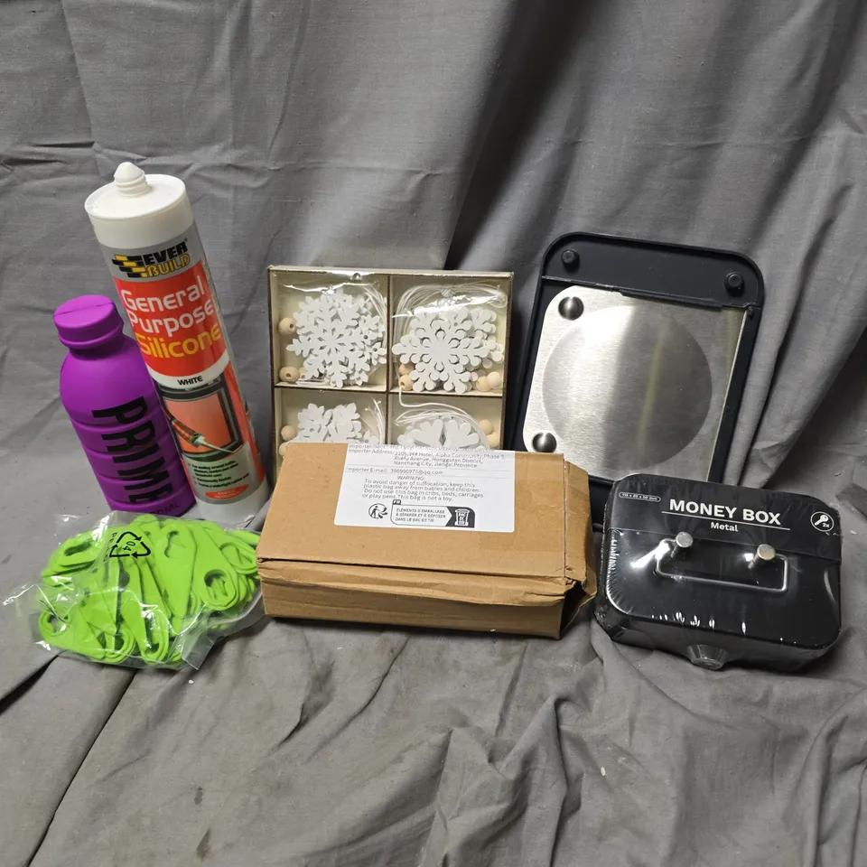 APPROXIMATELY 12 ASSORTED HOUSEHOLD ITEMS TO INCLUDE MONEY BOX, GENERAL PURPOSE SILICONE, WOODEN CHRISTMAS DECOR, ETC