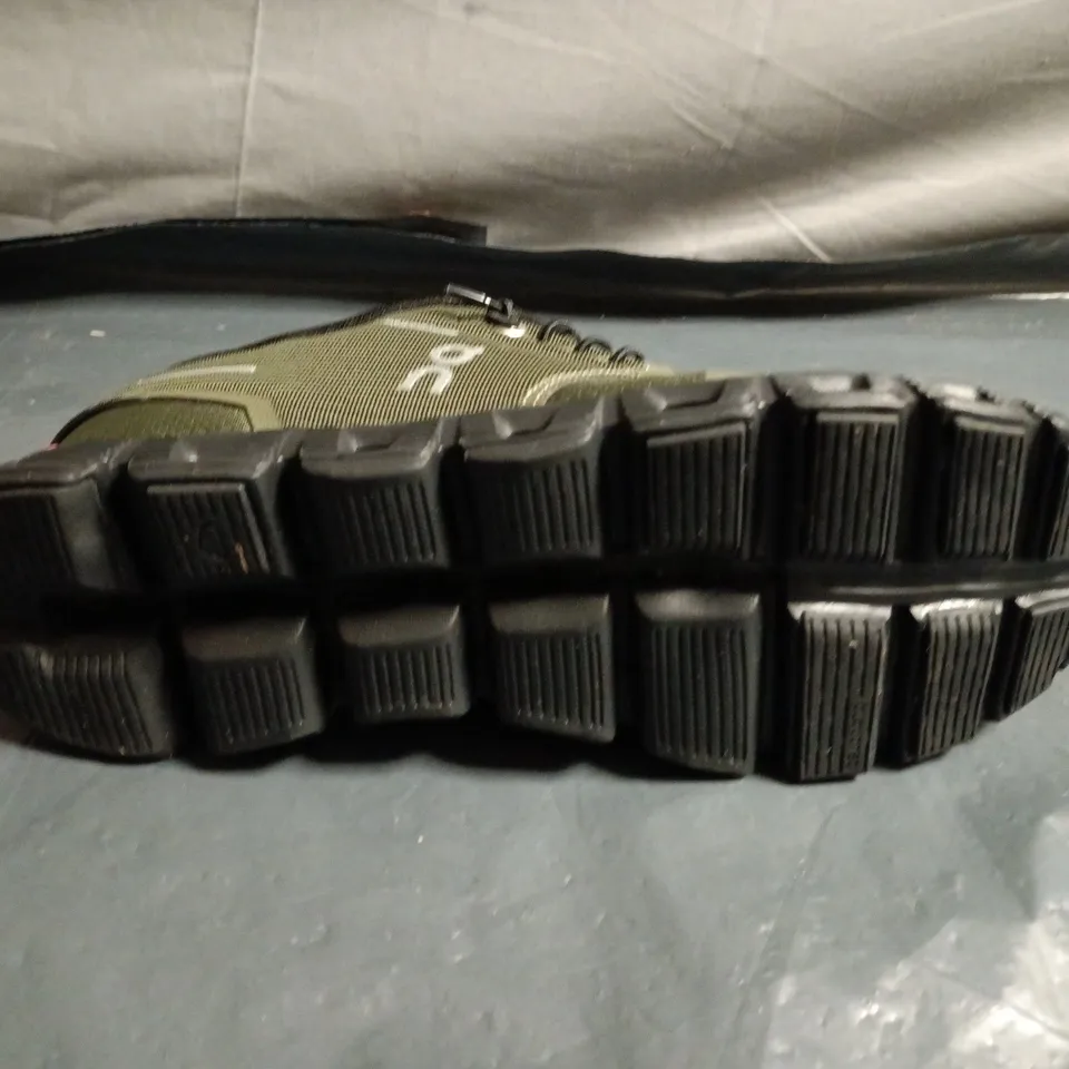 PAIR OF ON RUNNING OLIVE GREEN TRAIL SHOES – UK SIZE 7.5