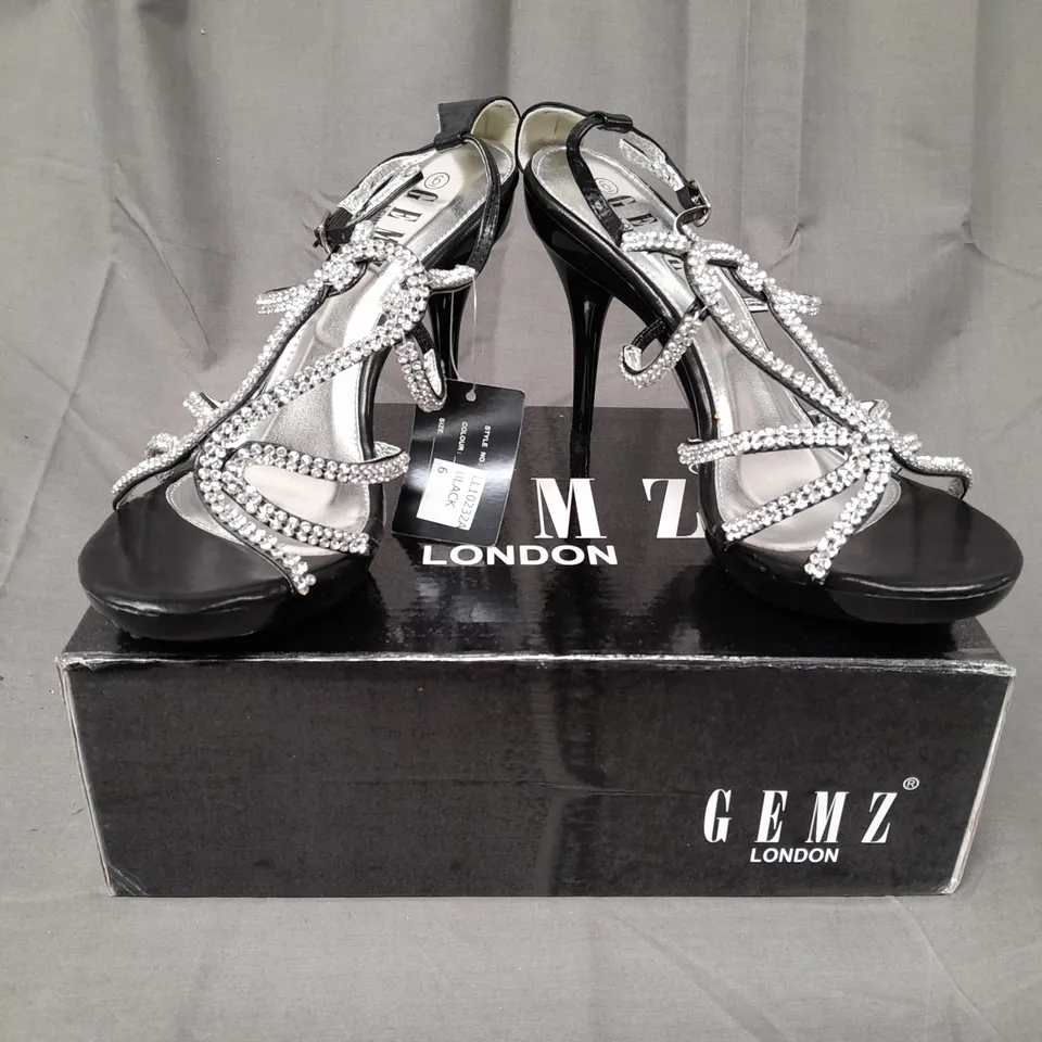 BOX OF APPROXIMATELY 12 ASSORTED PAIRS OF GEMZ LONDON OPEN TOE STRAPPY HEELED SANDALS IN VARIOUS SIZES