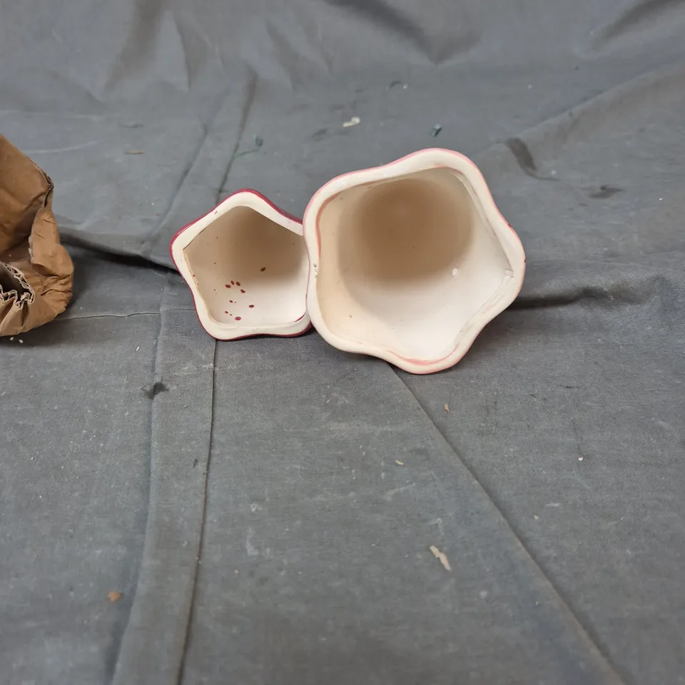 PAIR OF DECORATIVE CERAMIC MUSHROOMS, PINK GLAZE WITH RED SPECKLES