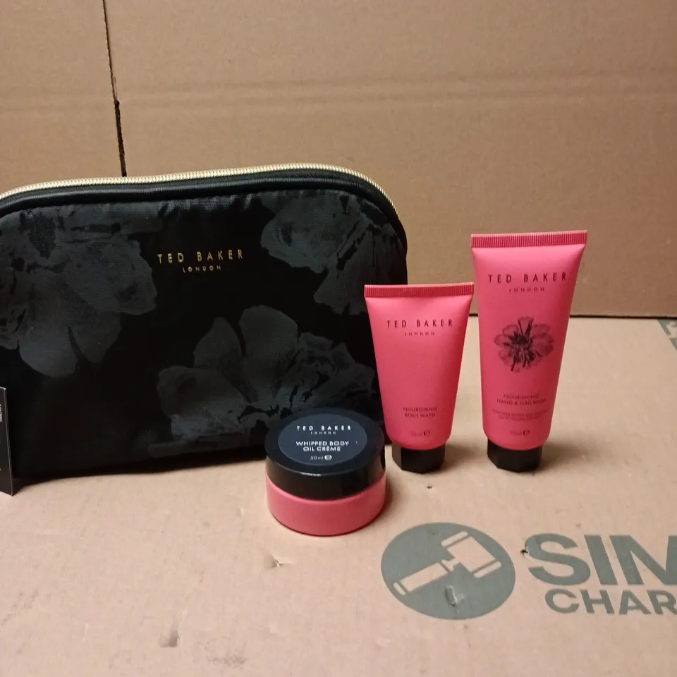 TED BAKER HAND AND BODY GIFT SET TO INCLUDE HAND & NAIL BALM, BODY WASH AND WHIPPED BODY OIL CREME IN A BLACK WASH BAG