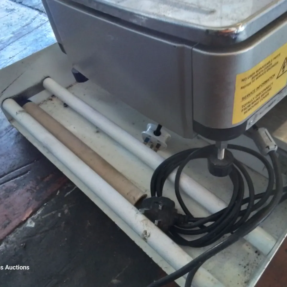 HERBERT DIGITAL SCALE & SHRINK WRAP DISPENCER