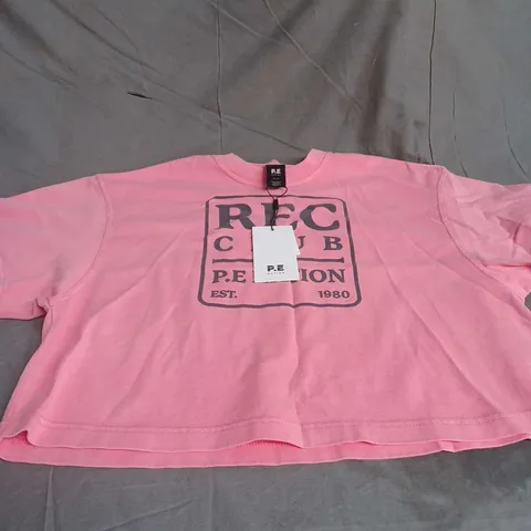 PE NATION RALLY TEE IN WASHED PINK LEMONADE SIZE XS