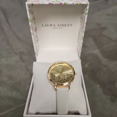 LAURA ASHLEY WATCH – FLORAL DIAL, GOLD-TONE CASE, WHITE STRAP