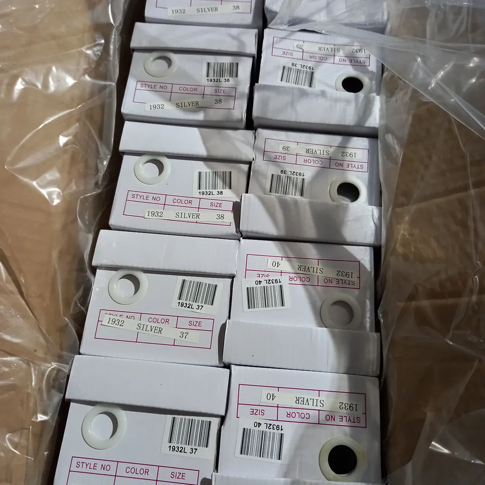 APPROXIMATELY 24 BOXED PAIRS OF LAVANDA STRAP SANDALS IN SILVER VARIOUS SIZES TO INCLUDE SIZES 37, 38, 39