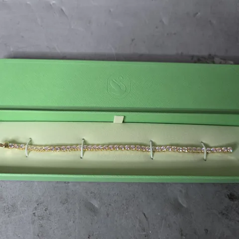 SWAROVSKI MATRIX GOLD-TONE PLATED ROUND CUT WHITE TENNIS BRACELET - LARGE