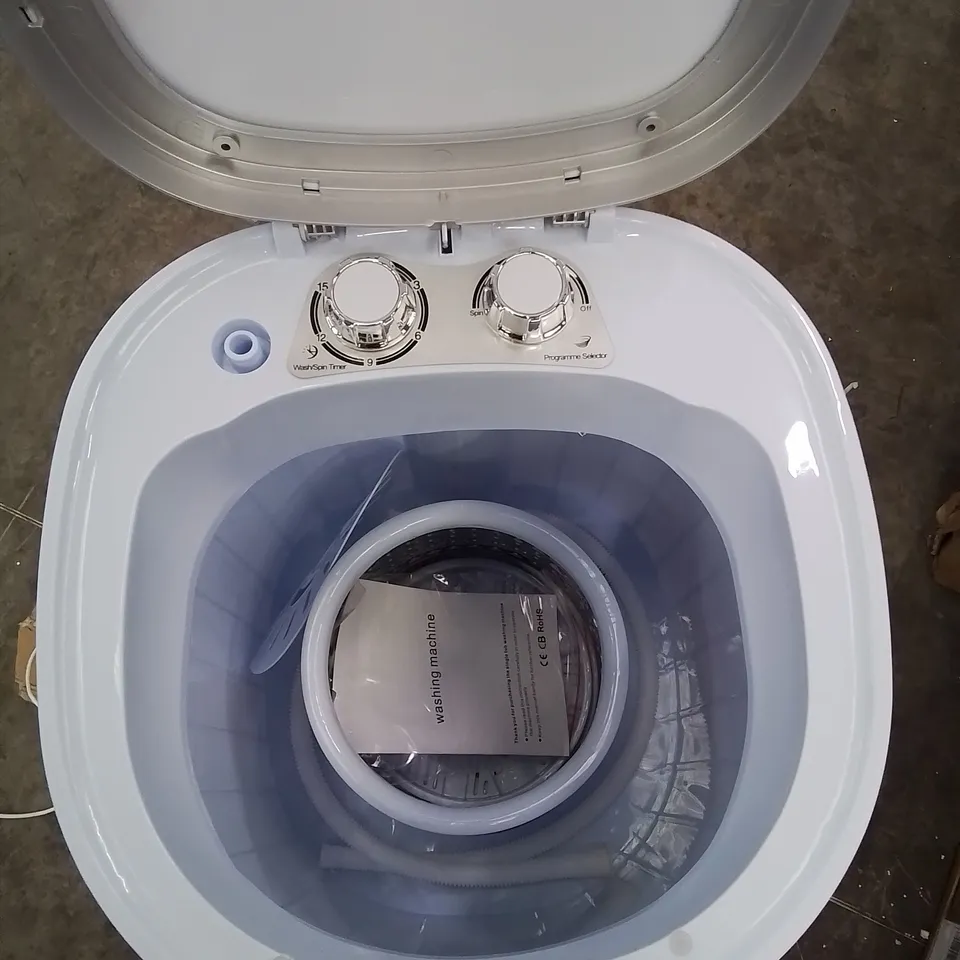 A BOXED PORTABLE MINI WASHING MACHINE AND SPIN DRYER SYSTEM 