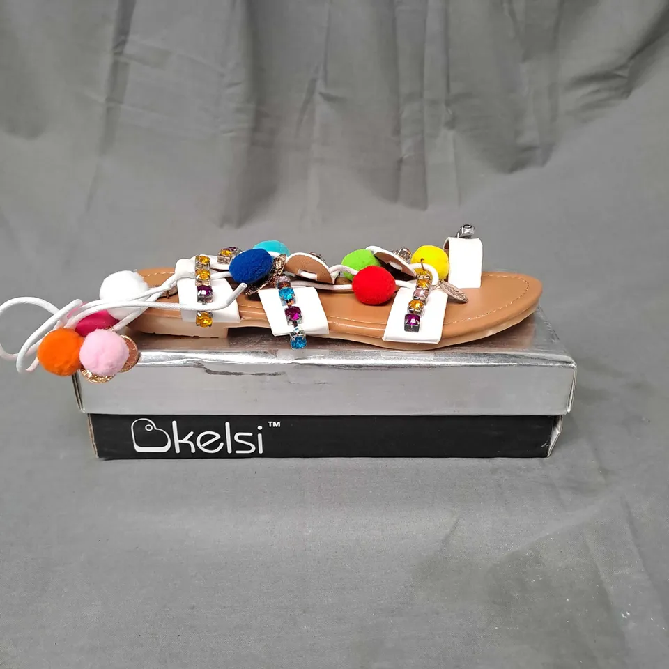 BOX OF APPROXIMATELY 8 PAIRS OF KELSI EMBELLISHED SANDALS IN WHITE - VARIOUS SIZES