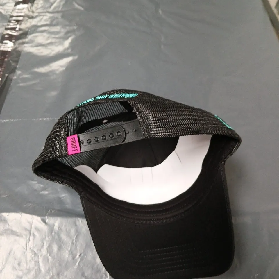 BLACK TRUCKER CAP WITH MESH BACK AND TEAL SLOGAN EMBROIDERY