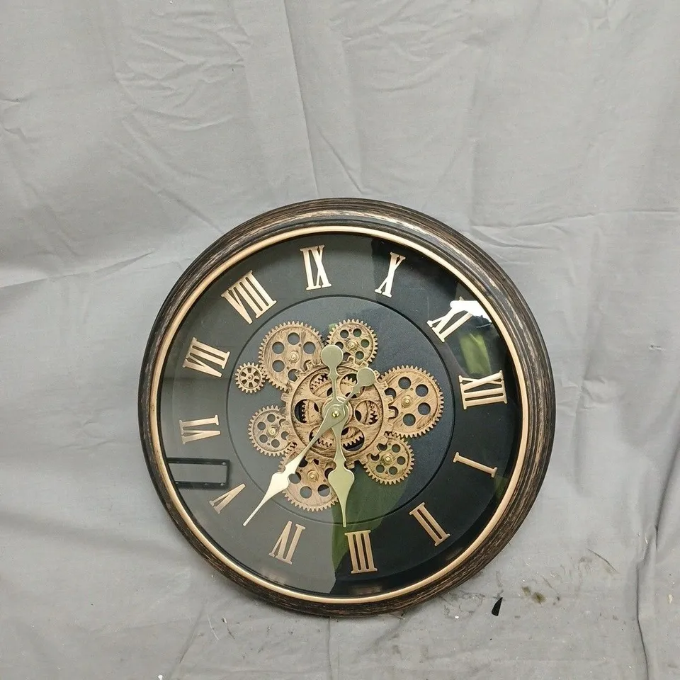 ROUND SKELETON GEAR WALL CLOCK – BRONZE FINISH WITH ROMAN NUMERALS
