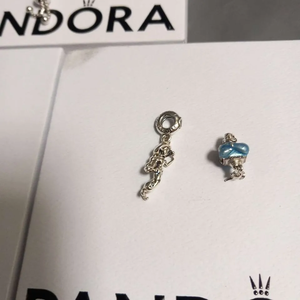 FOUR ASSORTED PANDORA PRODUCTS TO INCLUDE; BRACELTS AND CHARMS