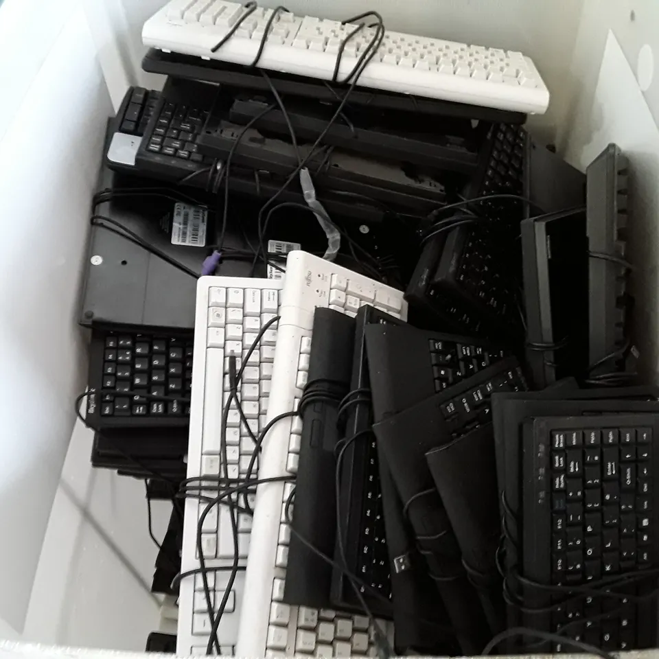 CAGE OF ASSORTED KEYBOARDS 