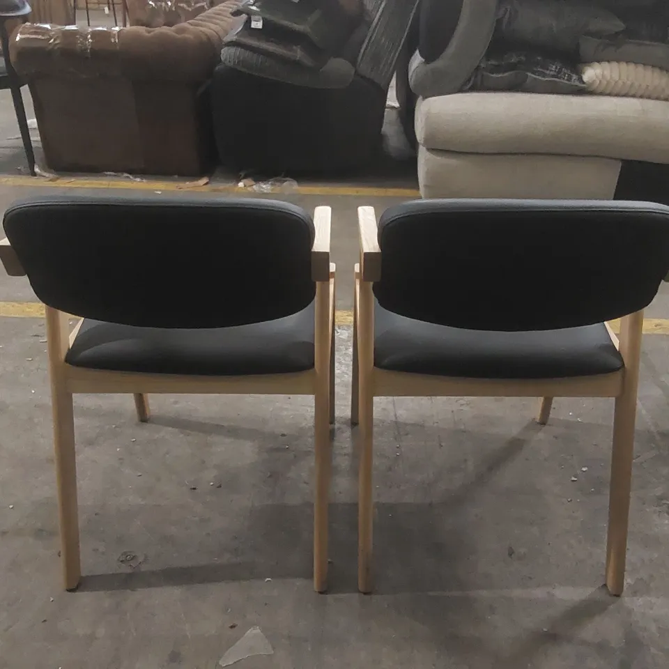 PAIR OF MAGNUS DINING CHAIRS - BLACK PU FAUX LEATHER SEAT - NATURAL ASH FRAME