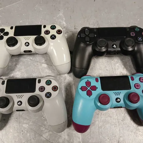 LOT OF 4 SONY PLAYSTATION WIRELESS CONTROLLERS