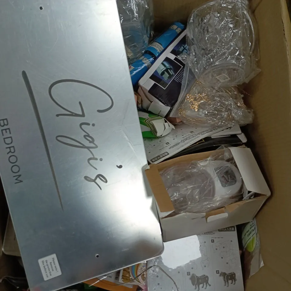 box of assorted household items to include.