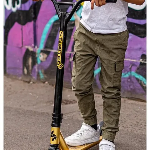 BOXED STUNTED GILT STUNT SCOOTER IN BLACK/GOLD