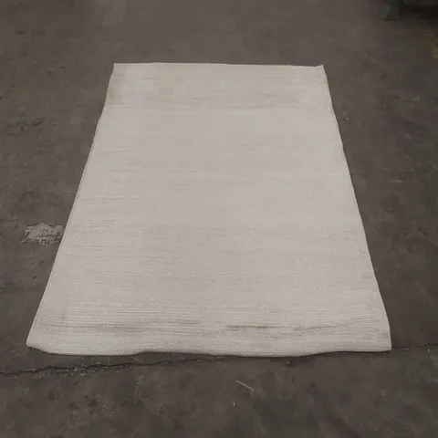 CREAM RECTANGULAR RUG - APPROXIMATELY 165 x 110cm