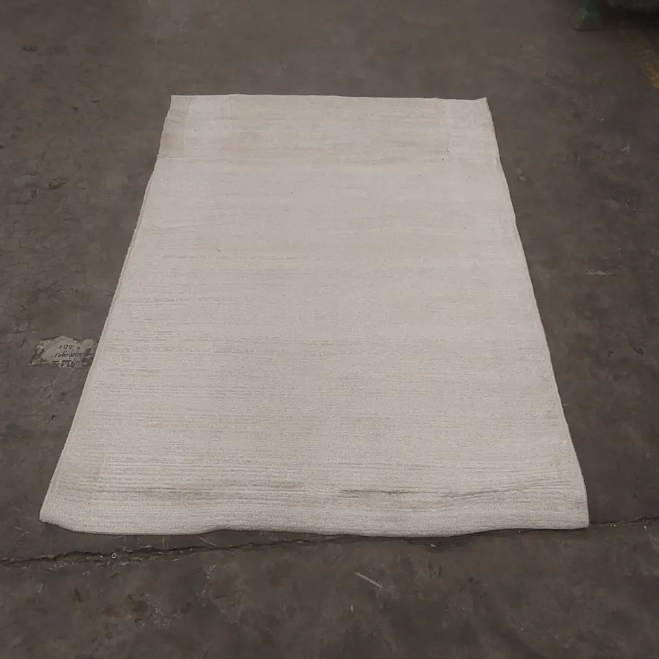 CREAM RECTANGULAR RUG - APPROXIMATELY 165 x 110cm
