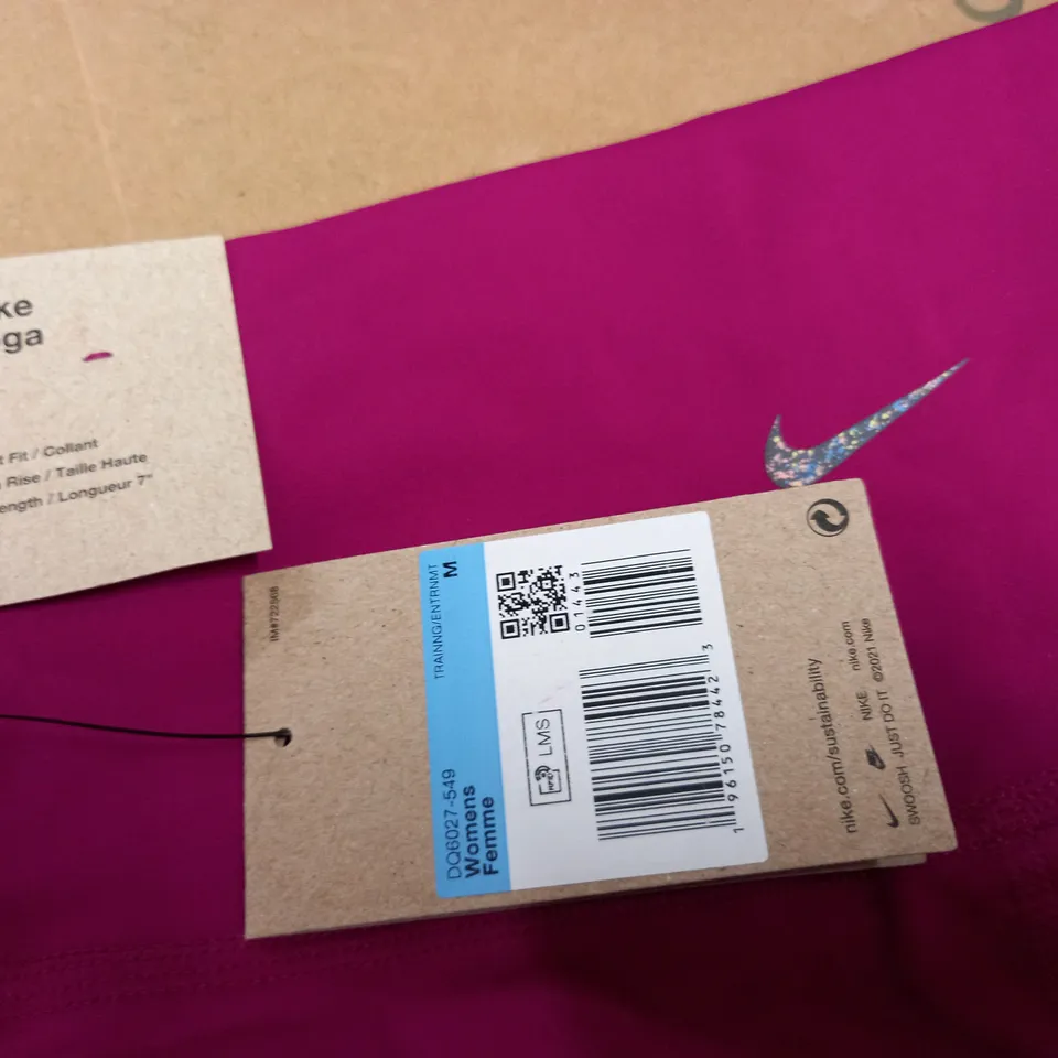 NIKE WOMENS PINK YOGA SHORTS - M