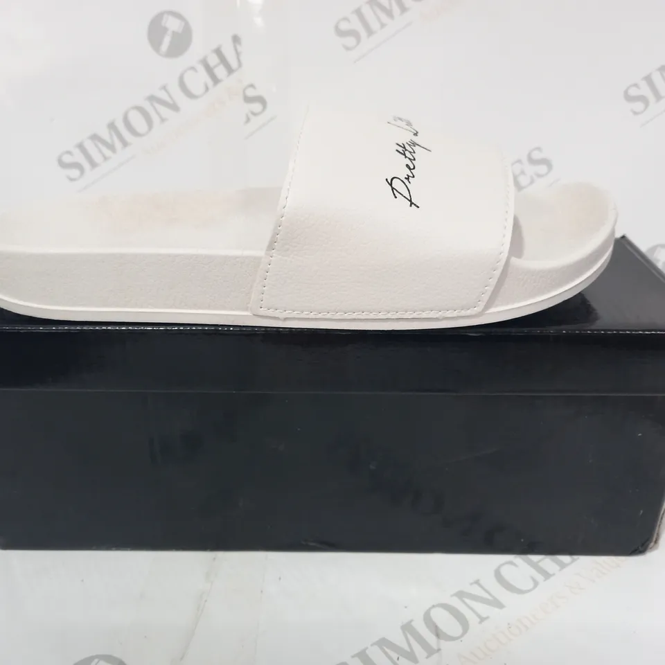 BOXED PAIR OF PRETTY LITTLE THING OPEN TOE SLIDERS IN WHITE EU SIZE 39