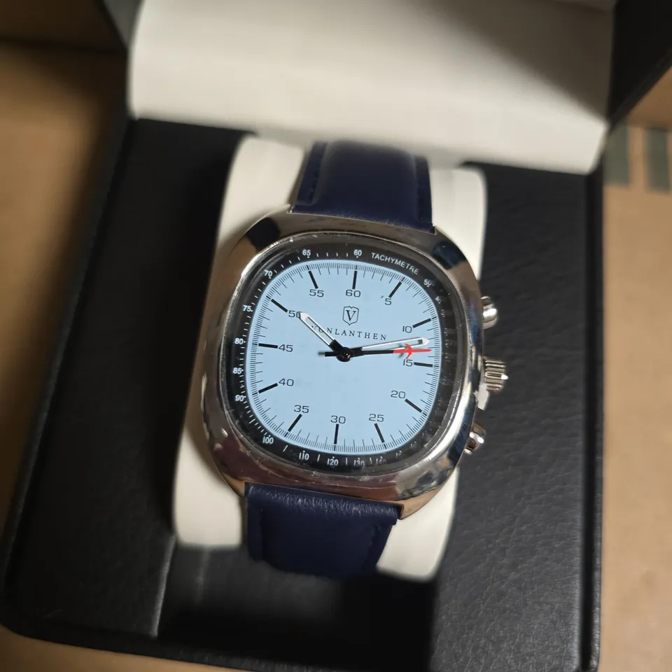 VONLANTHEN STAINLESS STEEL WRISTWATCH WITH LIGHT BLUE FACE & NAVY LEATHER STRAP