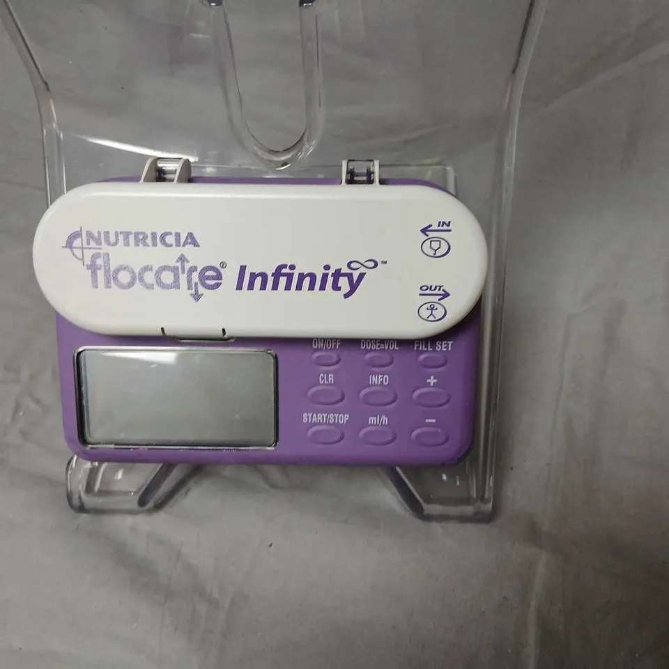 MEDICAL TRAINING BUNDLE: FEMALE TORSO MODEL, NUTRICIA FLOCARE INFINITY FEEDING PUMP, PUSLOM BACKPACK, ASSORTED CONSUMABLES 
