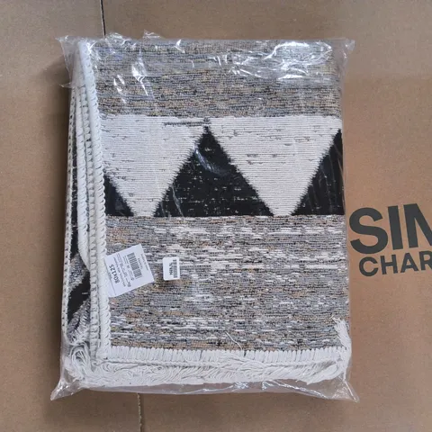 BOX OF APPROXIMATELY 10 SEALED RUGS