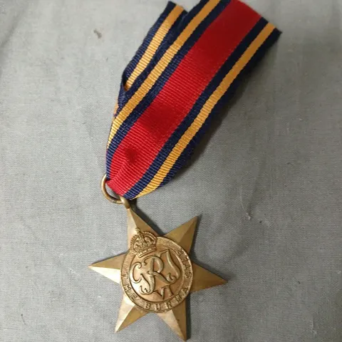 APPROXIMATELY 9 REPLICA BURMA STAR MEDALS