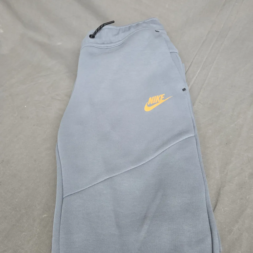 NIKE TECH TRACKSUIT BOTTOMS SIZE M