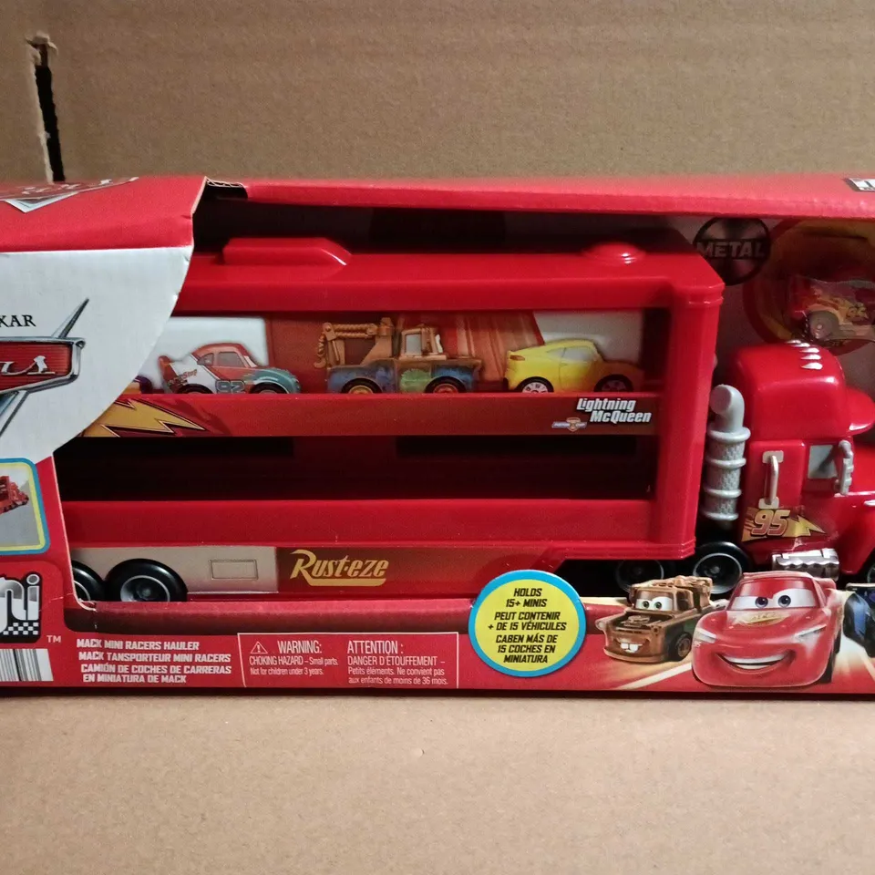 DISNEY PIXAR CARS MACK HAULER WITH MINI RACERS
