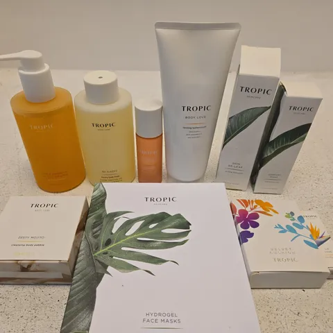 APPROX 10 ASSORTED TROPIC PRODUCTS TO INCLUDE BATH FOAM, BODY PEBBLE, HYDRATION MASK, ETC 